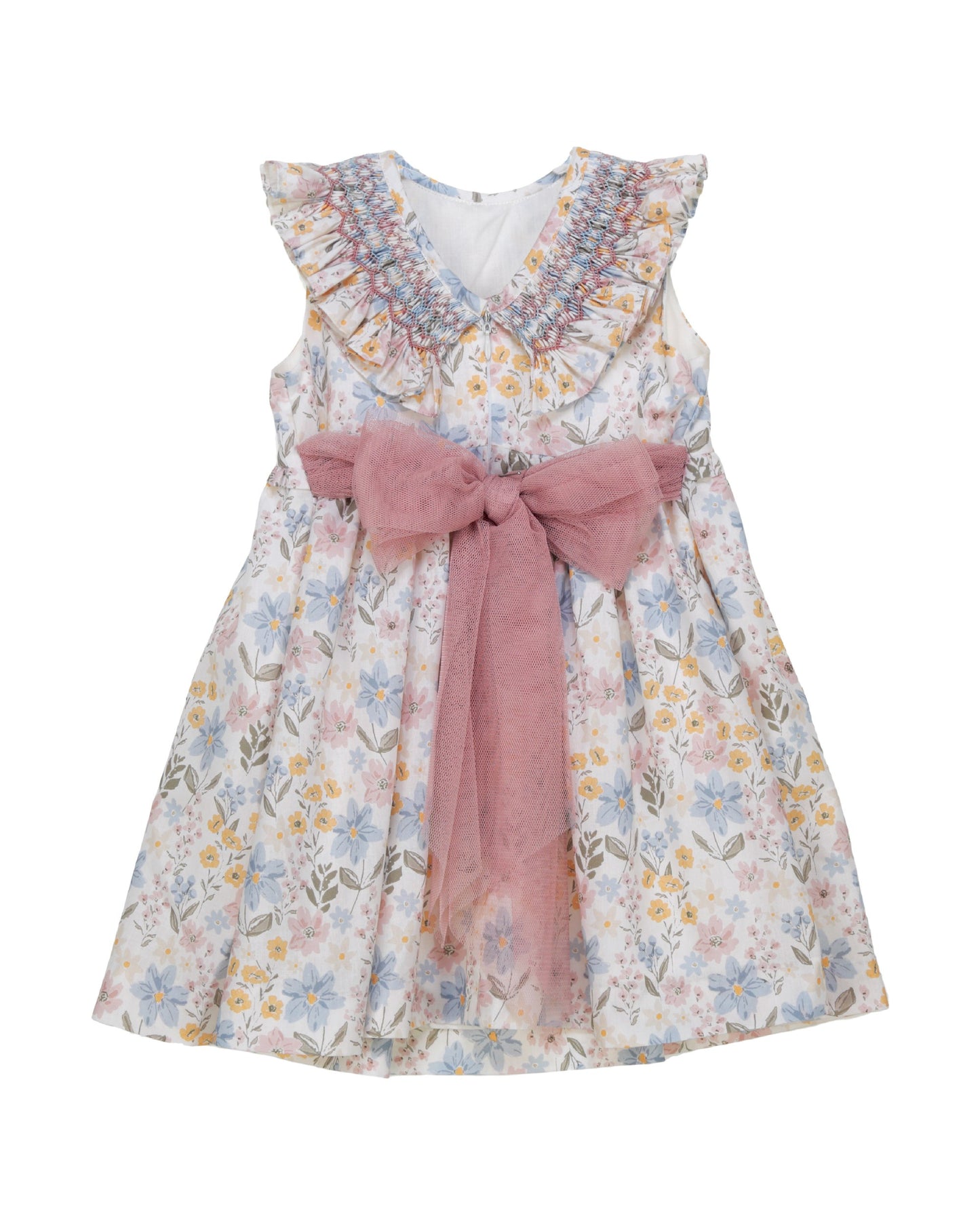 Back view of pastel floral girls dress with smocking detail and ruffle neckline