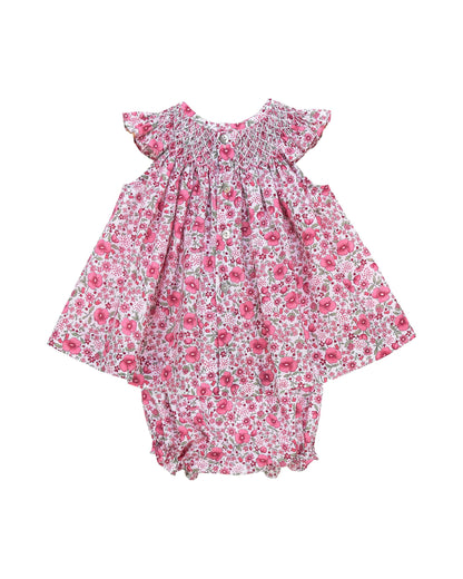 Back view of pink floral baby girl dress set with smocking and flutter sleeves