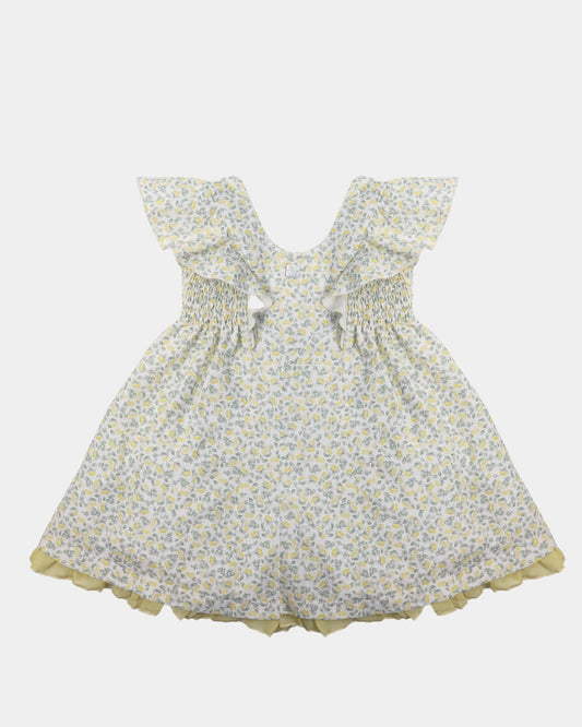 al agua patos girls lemon print dress with ruffled sleeves, smocked waist, and yellow ruffle hem.